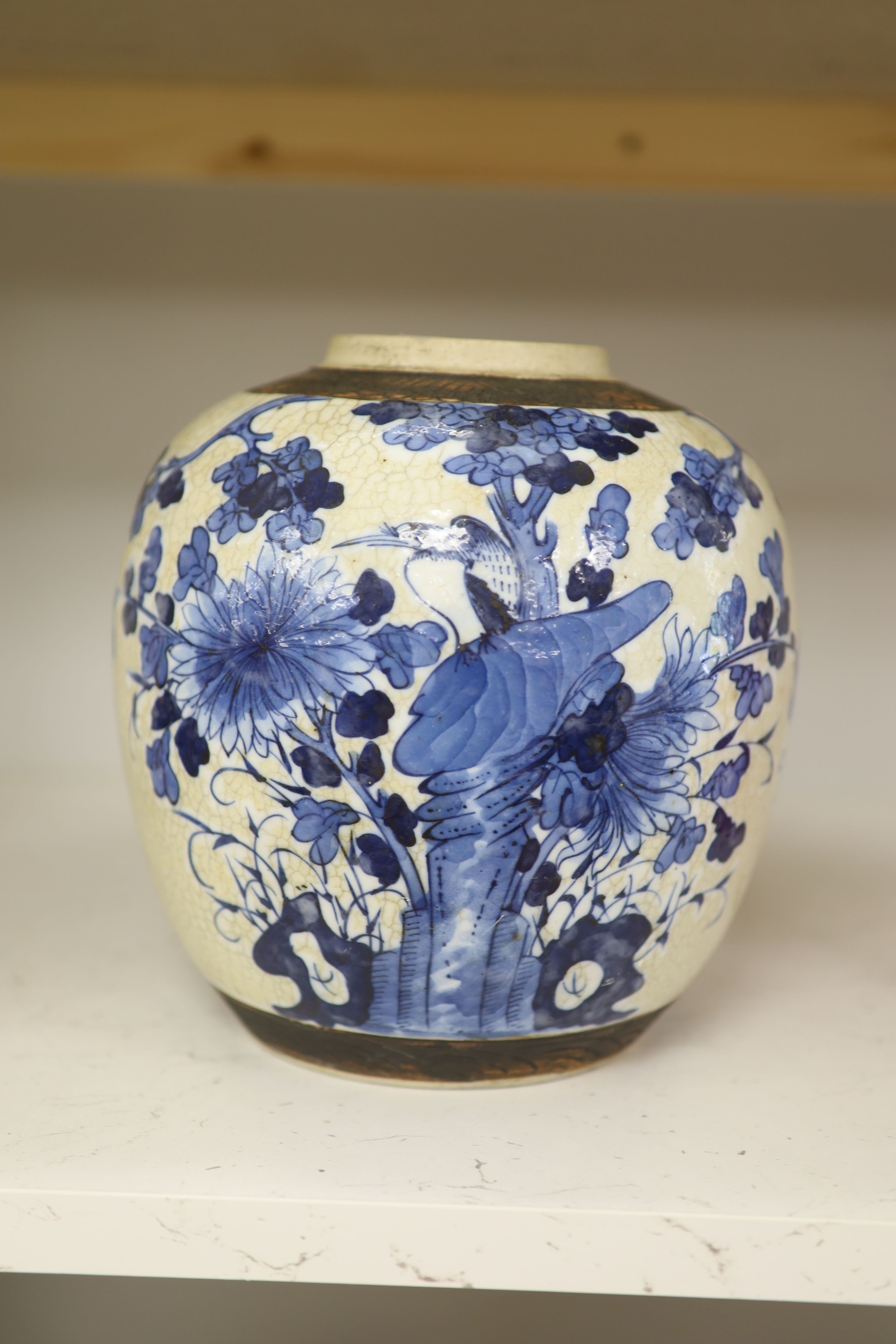 A 19th century/early 20th century Chinese blue and white crackle glaze jar, height 22cm